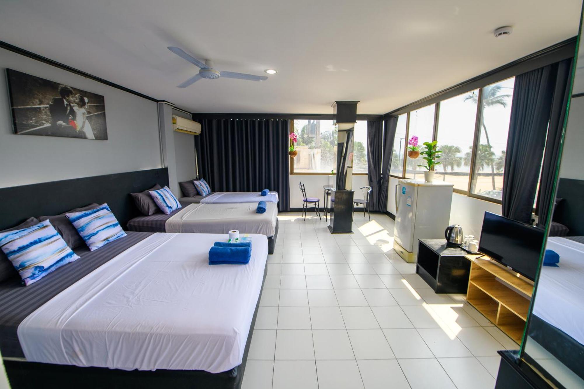 Happy Jomtien - Beachfront Zimmer foto